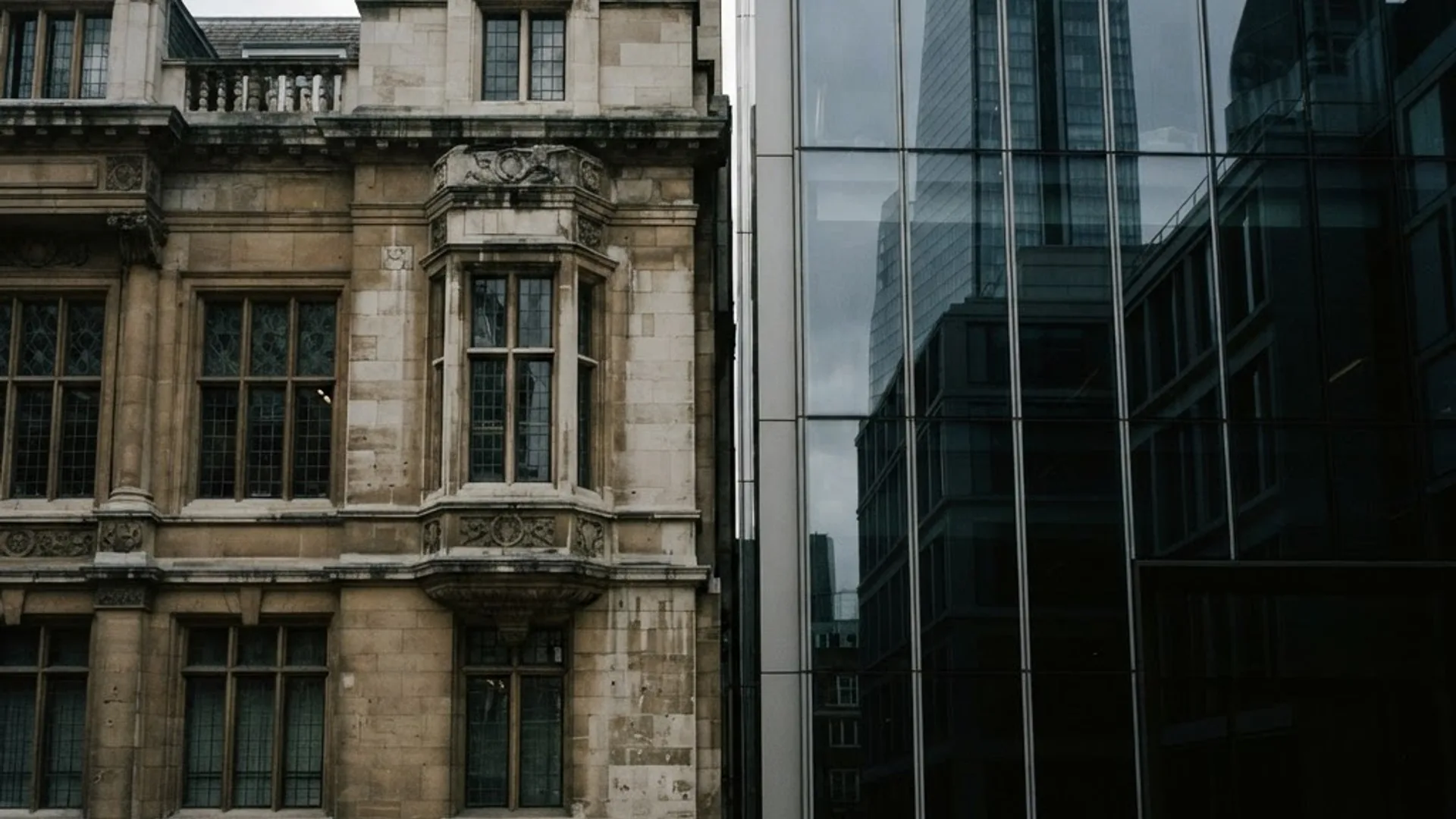 Precise junction between historic stone and modern glass architecture